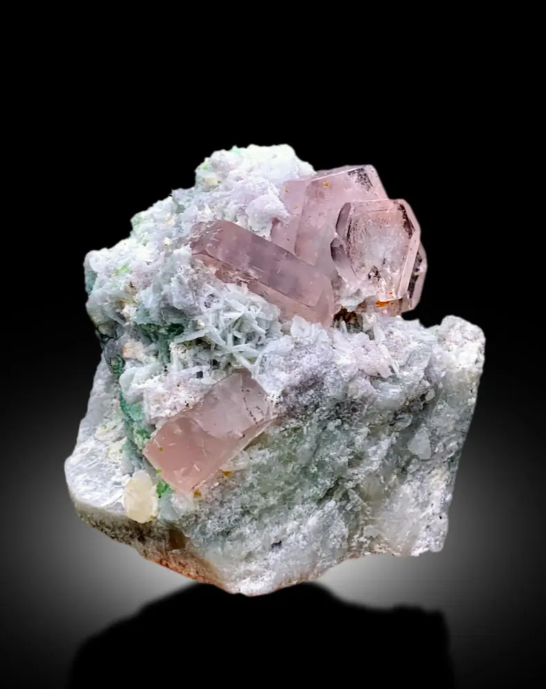 Morganite gemstone with soft pink tones, emphasizing its delicate appearance and clarity.