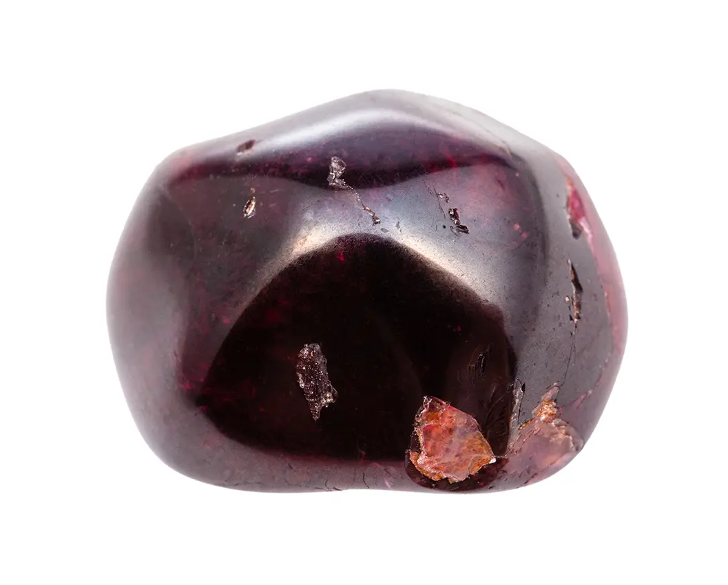 Almandine garnet gemstone with deep red hues