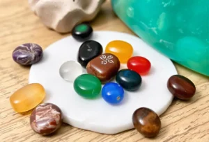 Multiple chakra stones on table